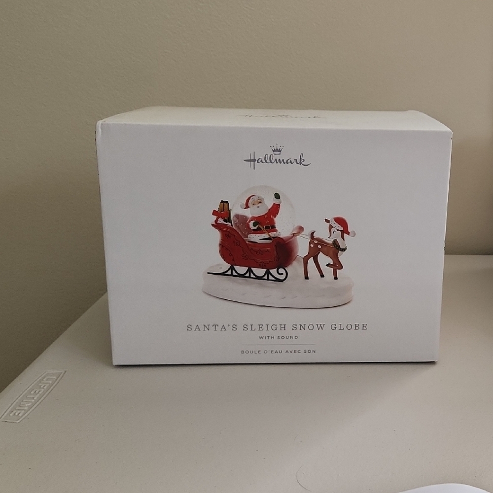 Hallmark Festive Red Santa Snow Globe